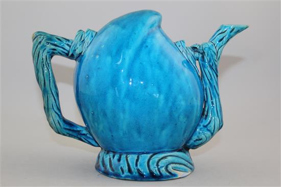 A Chinese turquoise glazed peach shaped cadogan type wine pot, 19th century, height 17.5cm